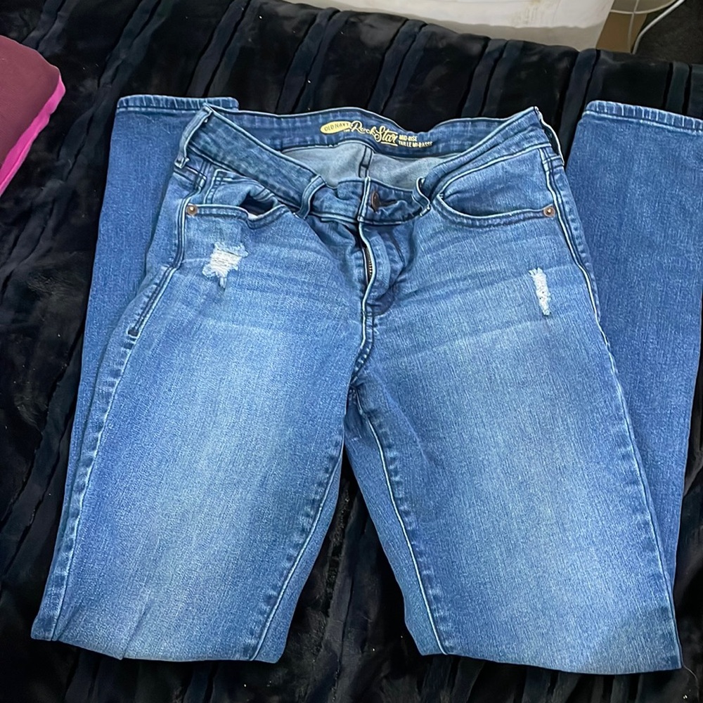 Old navy mid-rise skinny jeans with rips in the knees
